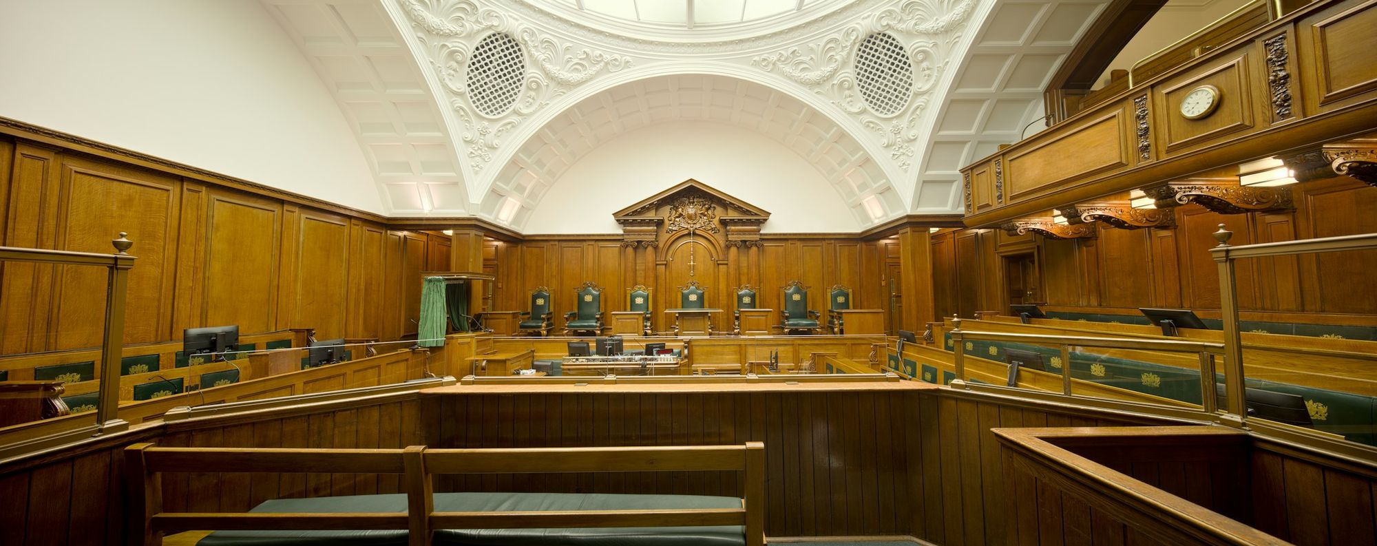 Empty courtroom with wood panelling